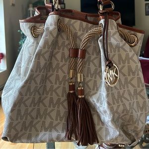 Michael Kors draw string satchel UEC clean inside like new